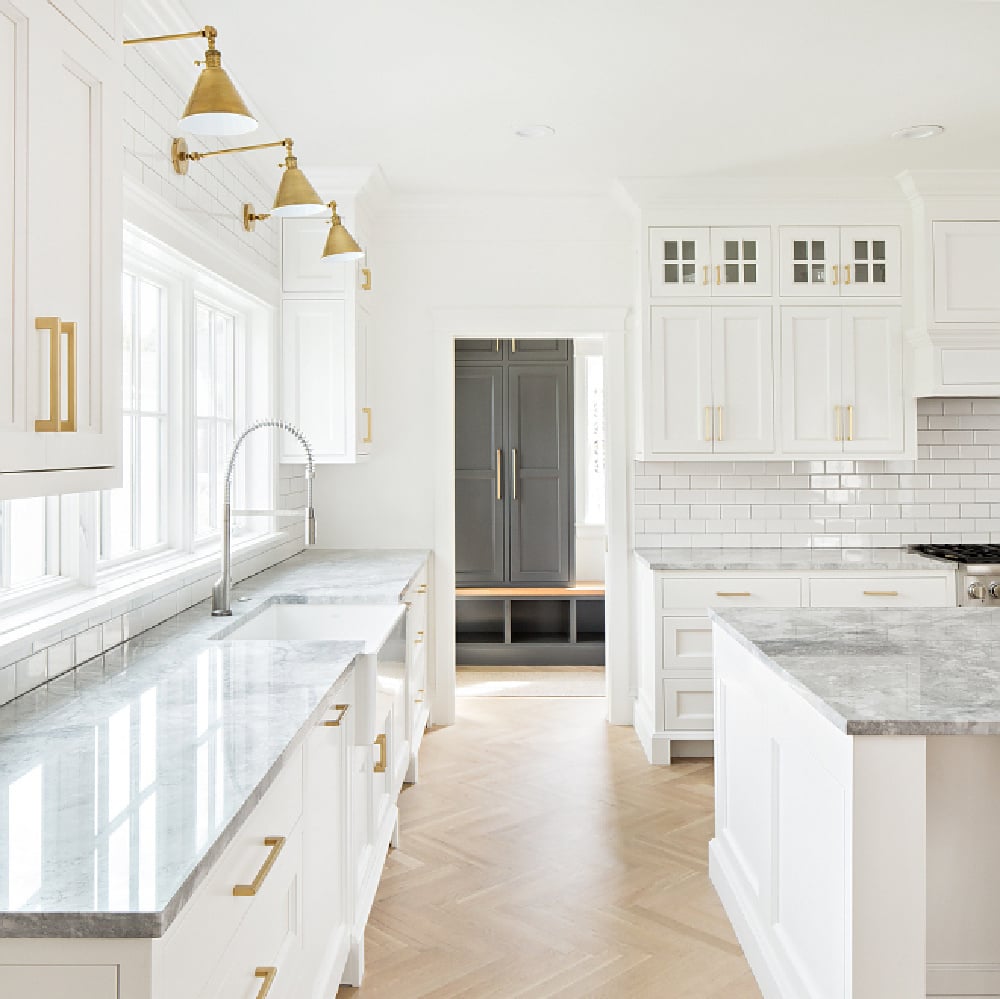 benjamin-moore-simply-white-luxurious-white-traditional-kitchen-herringbone-wood-floor-thefoxgroup